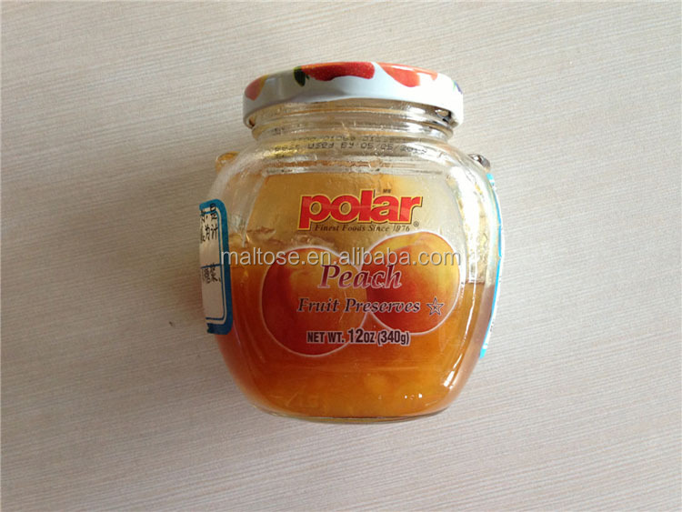 canned glass jar peach jam/ peach syrup with pulp