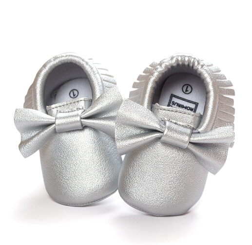 新しい生まれた赤ちゃんの幼児の靴底ソフトpu素材で弓のデザインとタッセル仕入れ・メーカー・工場