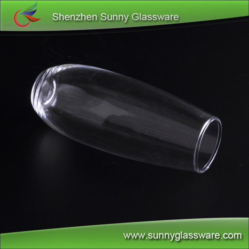 transparent tall drinking glass used for home goods