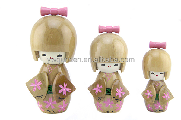 Muñecas japonesas de madera deals