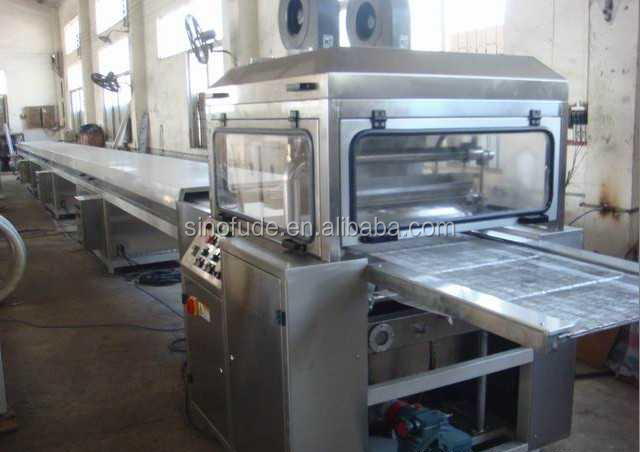 Chocolate enrober with cooling tunnel