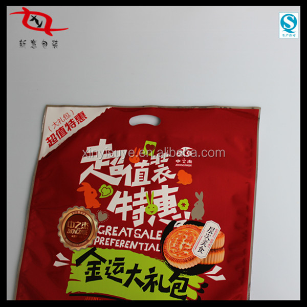Specialized in color printing laminating new design packaging plastic bags with header from china manufacturer