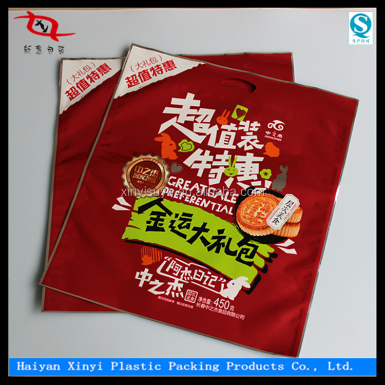 Specialized in color printing laminating new design packaging plastic bags with header from china manufacturer