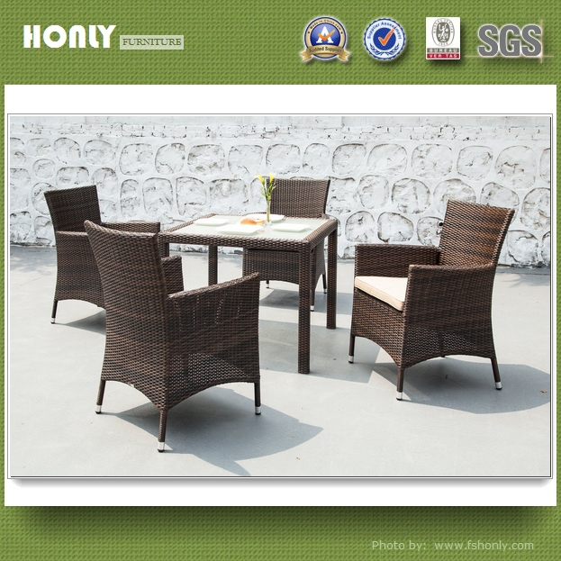 Modern ratan dining table glass top rattan chairs and tables
